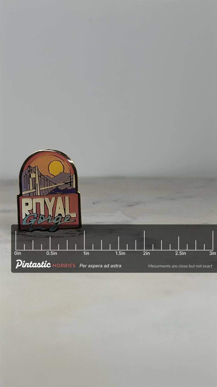 Royal Gorge Souvenir Pin: Sunset Pastel Enamel - Vintage Travel Accessory with ruler overlay for size reference