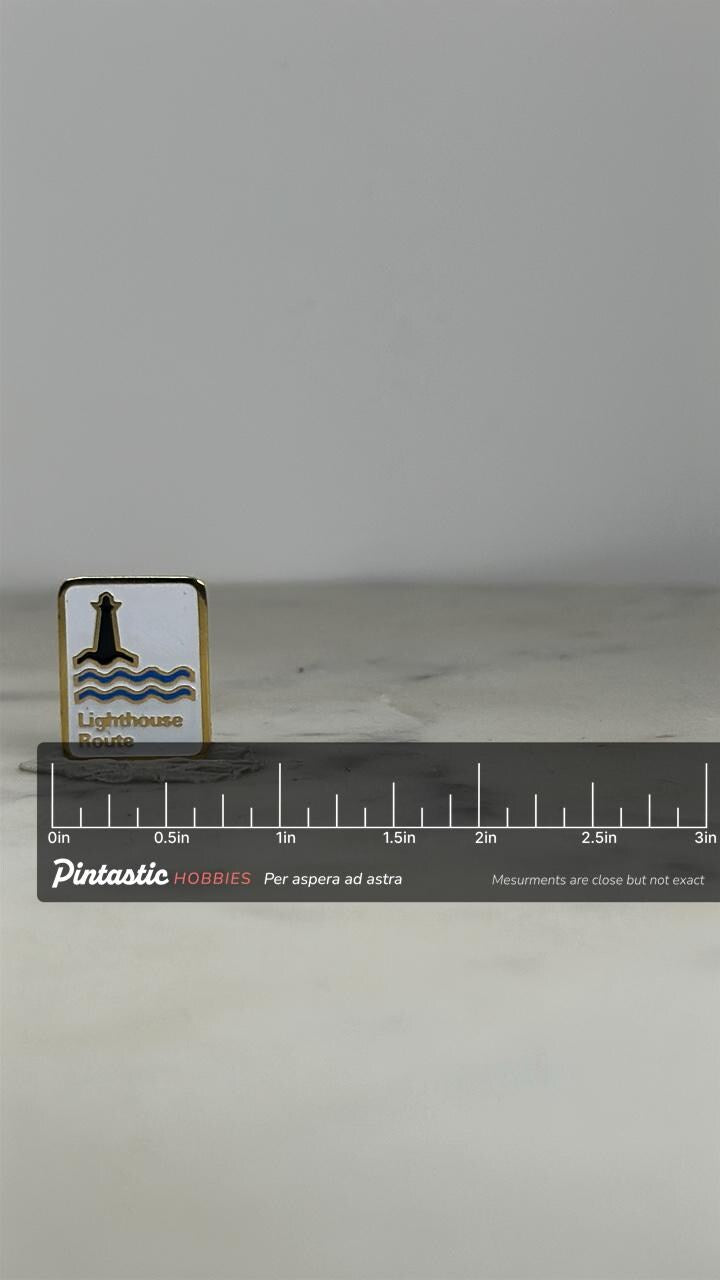 Lighthouse Route Pin: Gold Trim & Enamel - Vintage Coastal Accessory with ruler overlay for size reference