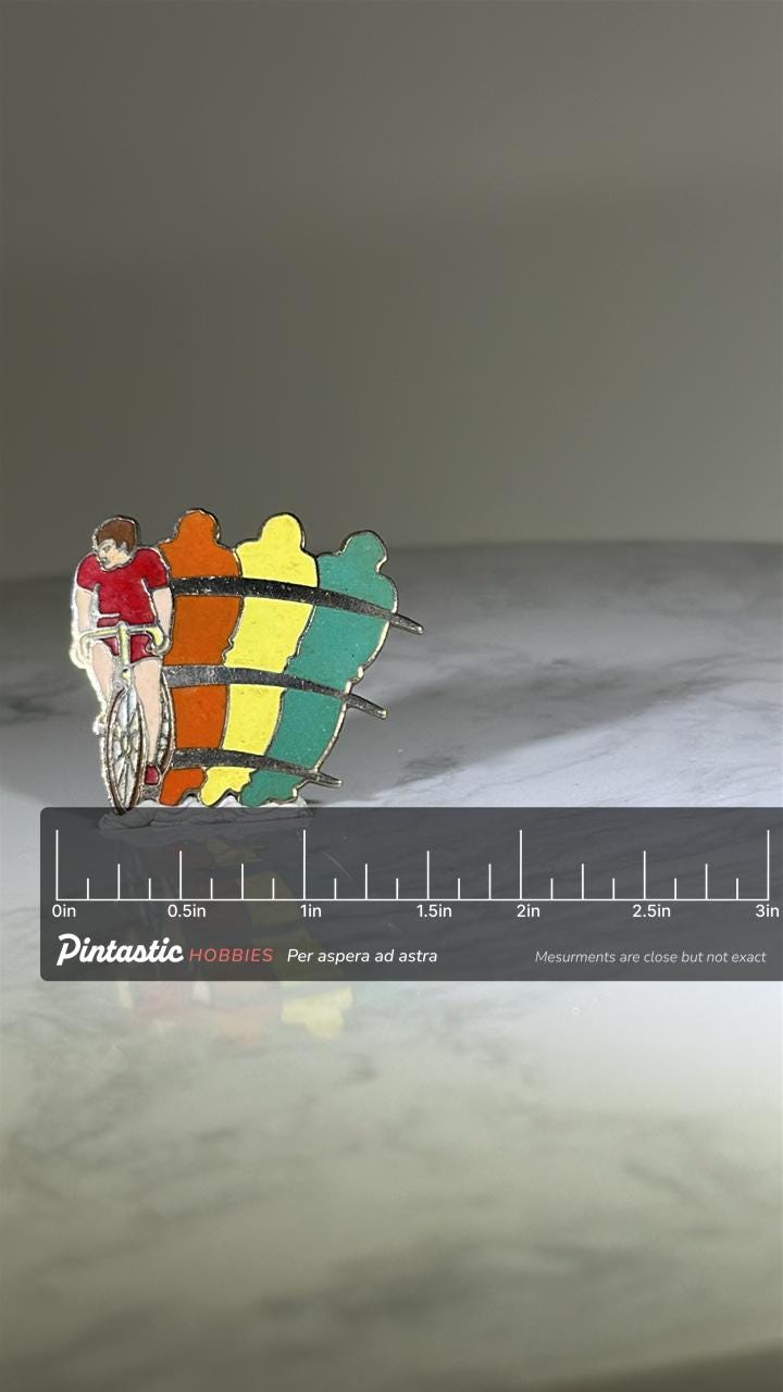 Cyclist Racing Enamel Pin: Retro Multicolor Finish - 1980s Sports Accessory with ruler overlay for size reference