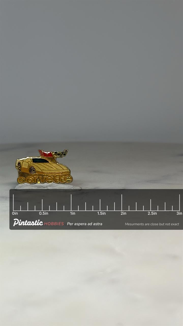 Corvette Car Pin: Gold Tone Enamel - Vintage Auto Accessory with ruler overlay for size reference