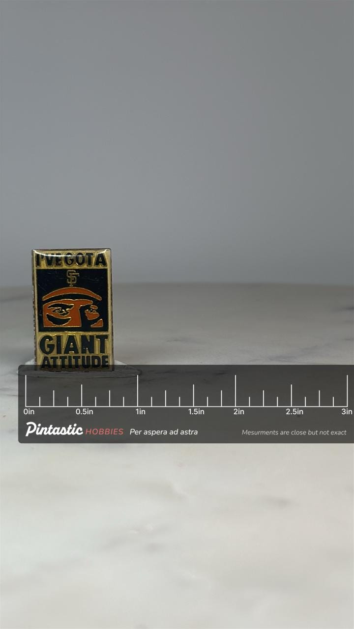 San Francisco Giants Pin: Black & Gold Enamel - Vintage Sports Accessory with ruler overlay for size reference