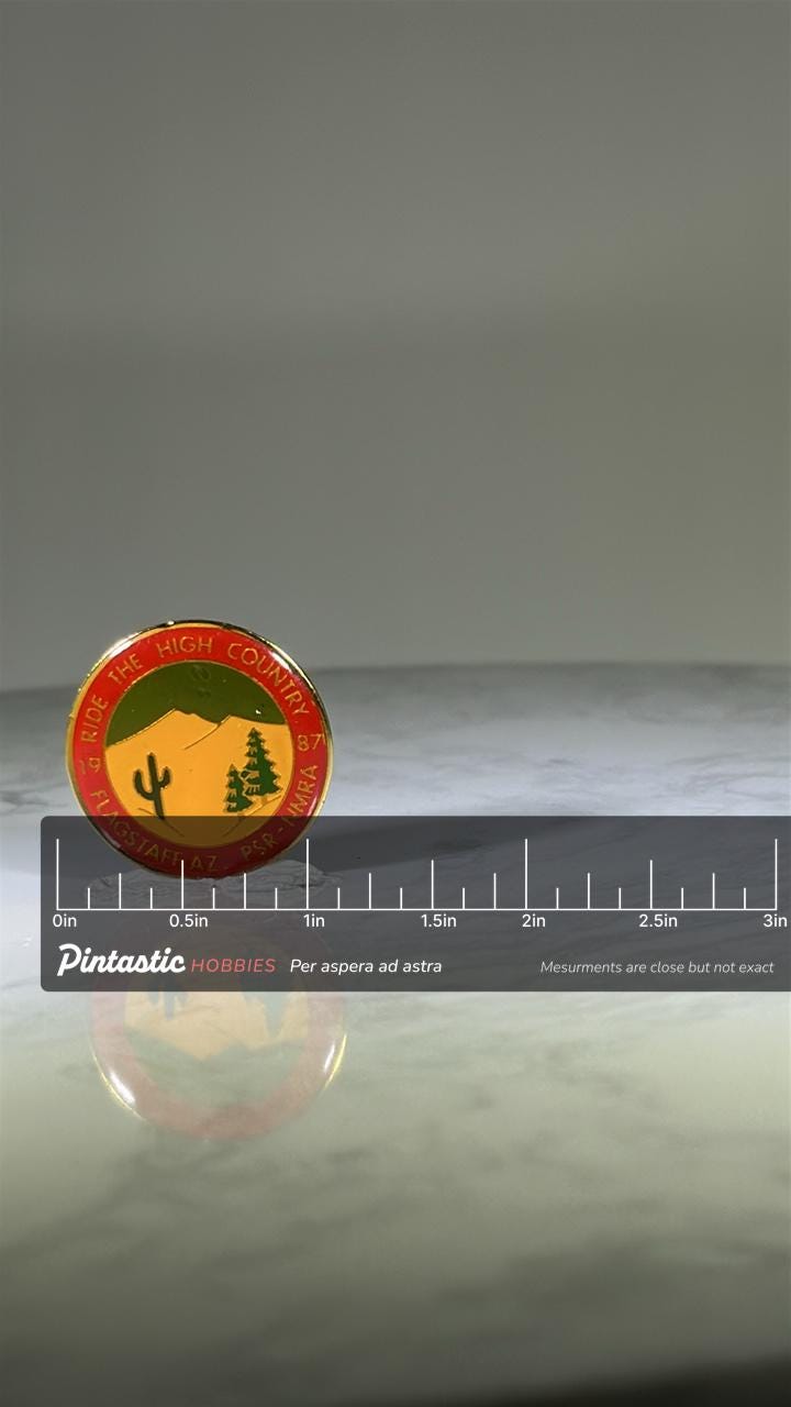 Ride the High Country Pin: Red & Yellow Enamel - 1987 Flagstaff AZ Accessory with ruler overlay for size reference