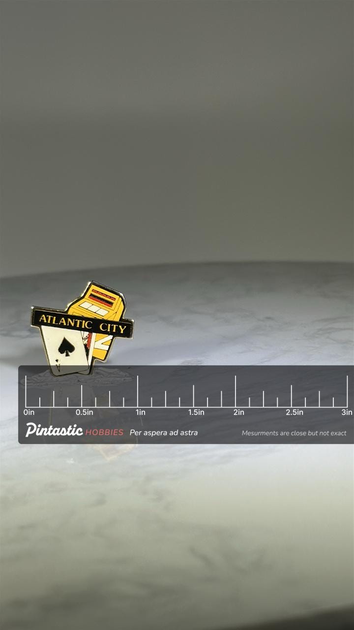 Atlantic City Casino Pin: Enamel Slot Machine & Cards - Vintage Souvenir Accessory with ruler overlay for size reference