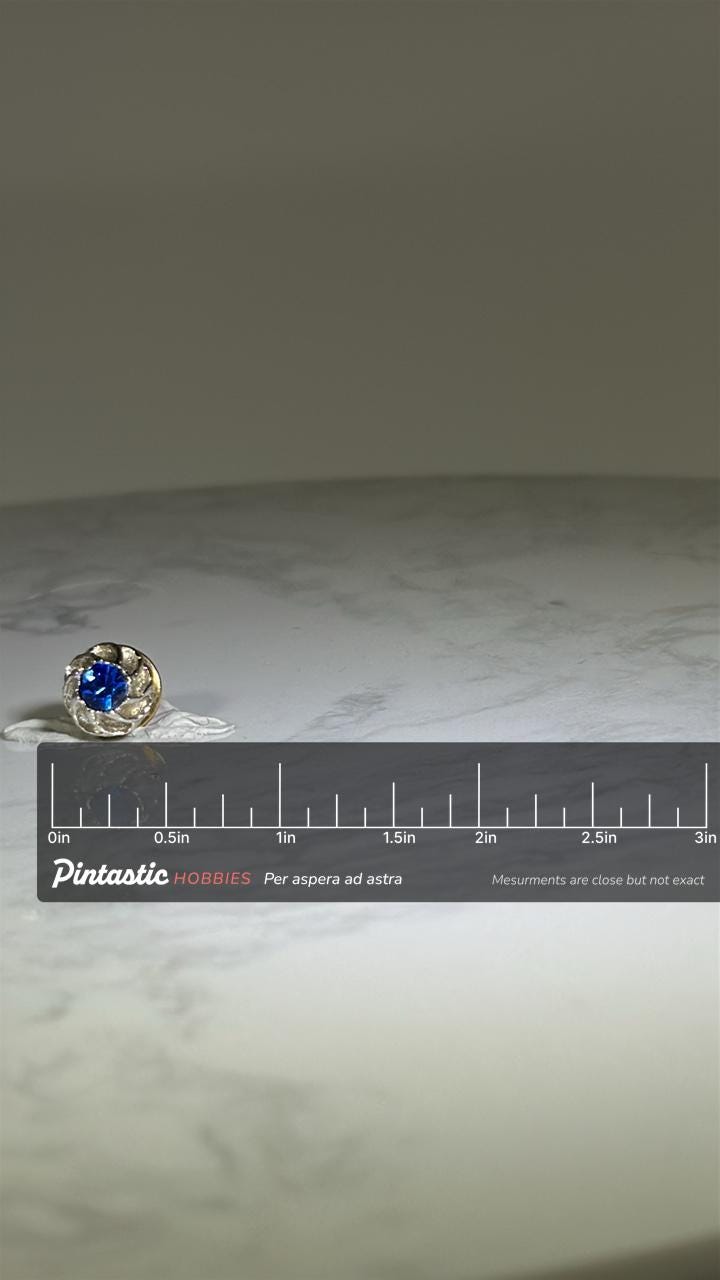 Blue Gem Floral Lapel Pin: Silver Tone Finish - Vintage Accessory with ruler overlay for size reference
