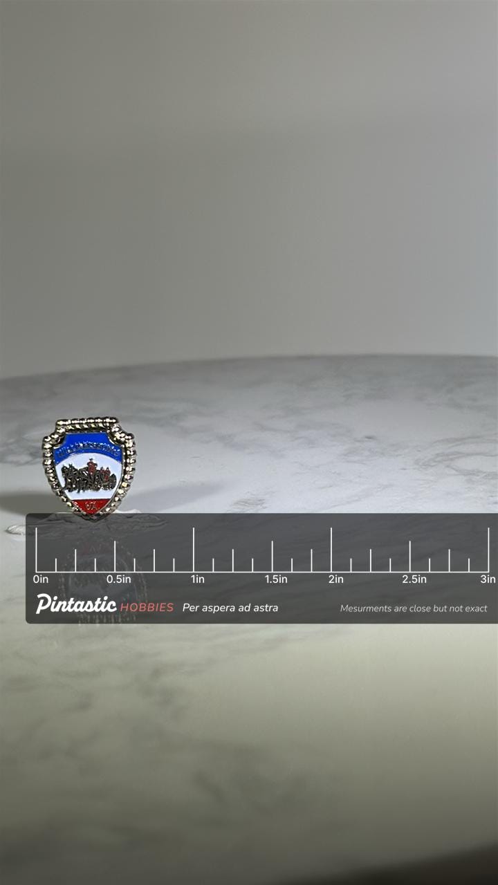 Williamsburg VA Shield Pin: Silver Tone Enamel - Historic Travel Accessory with ruler overlay for size reference