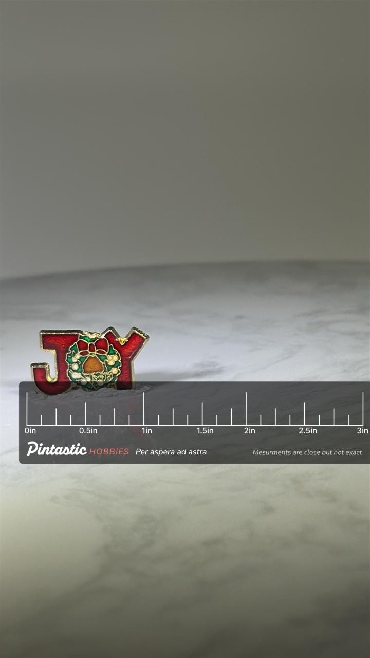 Joy Christmas Pin: Red Enamel Goldtone - Holiday Seasonal Accessory with ruler overlay for size reference