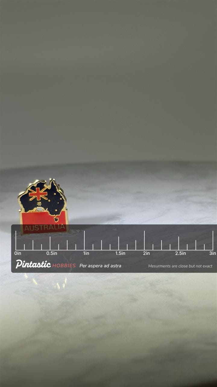 Australia Flag Map Pin: Gold Enamel Finish - Patriotic Travel Accessory with ruler overlay for size reference