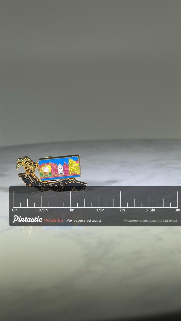 Curaçao Souvenir Pin: Enamel & Gold Tone - Caribbean Travel Accessory with ruler overlay for size reference