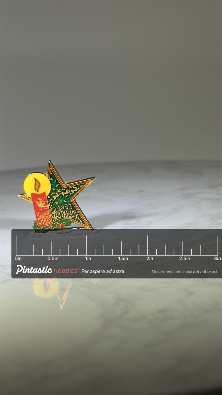 Hollywood Christmas Parade Pin: Gold Enamel Star - 1993 Holiday Accessory with ruler overlay for size reference