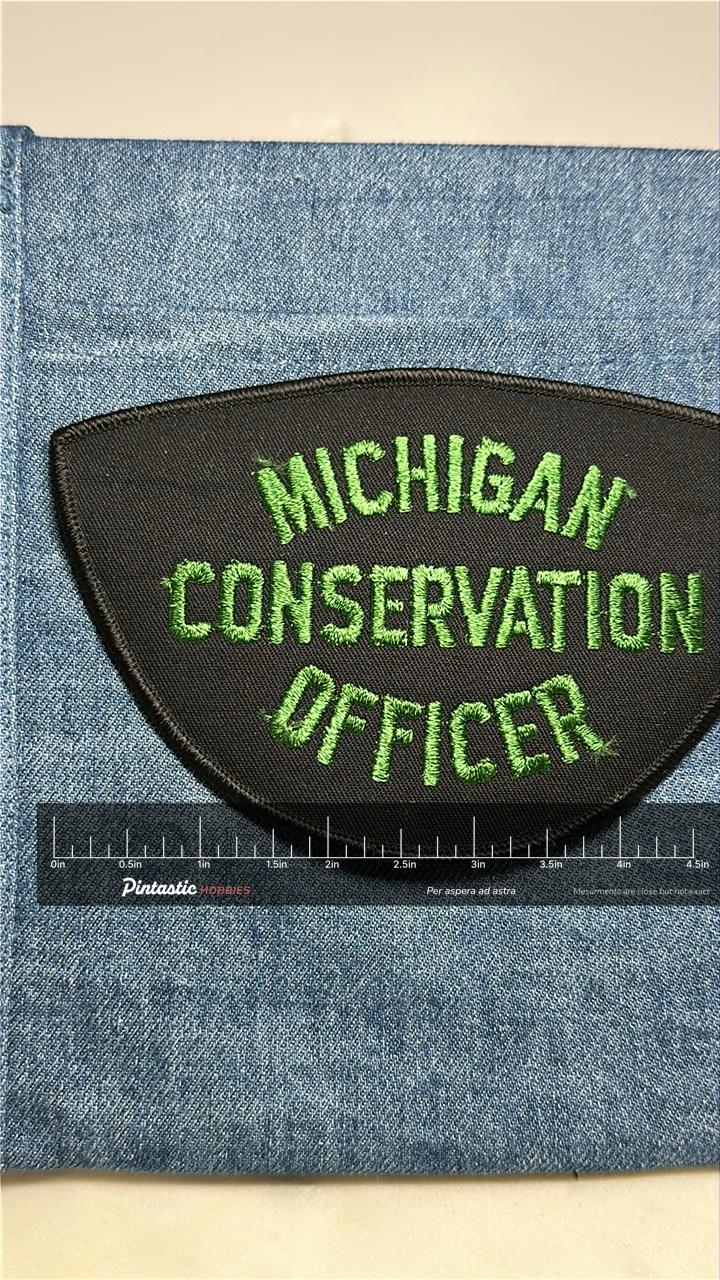 Michigan Conservation Officer Collectable Iron-On Patch: Black & Green Colored - Vintage Accessory with ruler overlay for siz