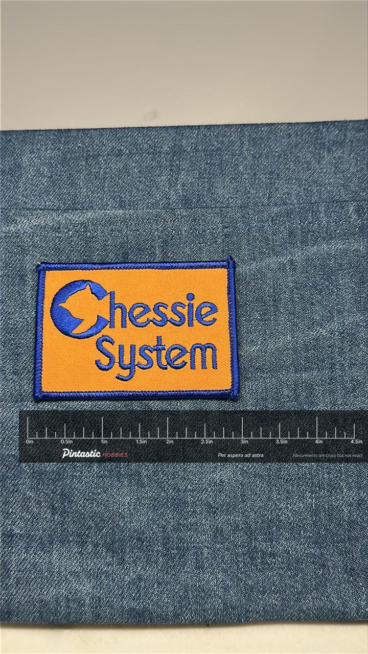 Chessie System Collectable Patch: Iron-On Orange Blue - Railroad Accessory with ruler overlay for size reference