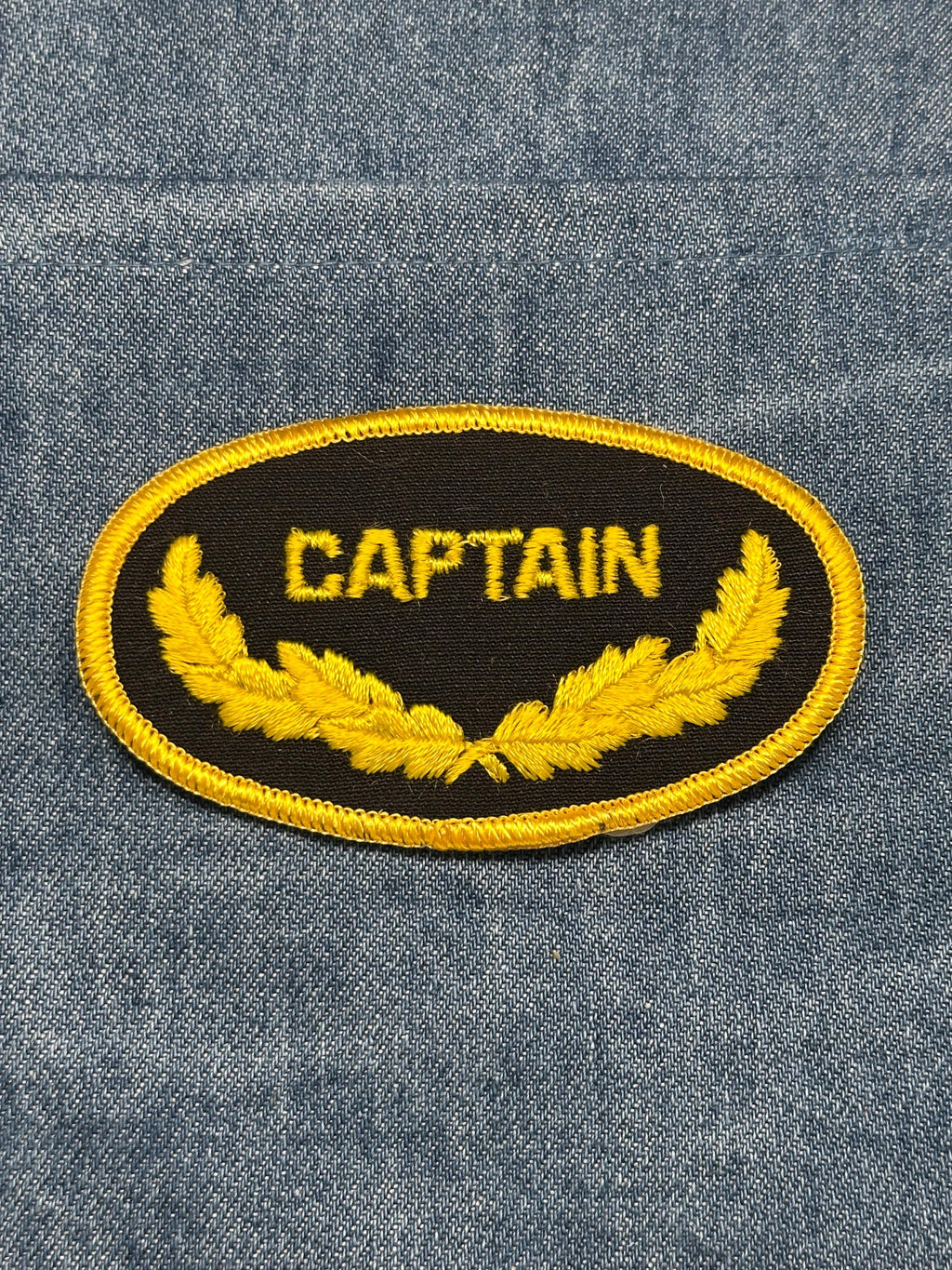 Captain Collectable Patch: Iron-On Black and Gold Oval - Vintage Accessory