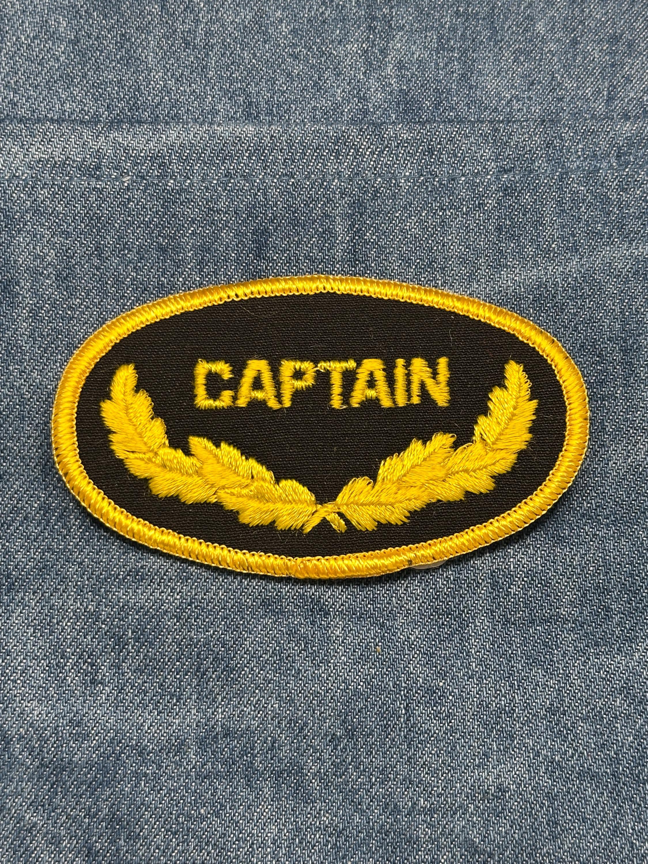 Captain Collectable Patch: Iron-On Black and Gold Oval - Vintage Accessory