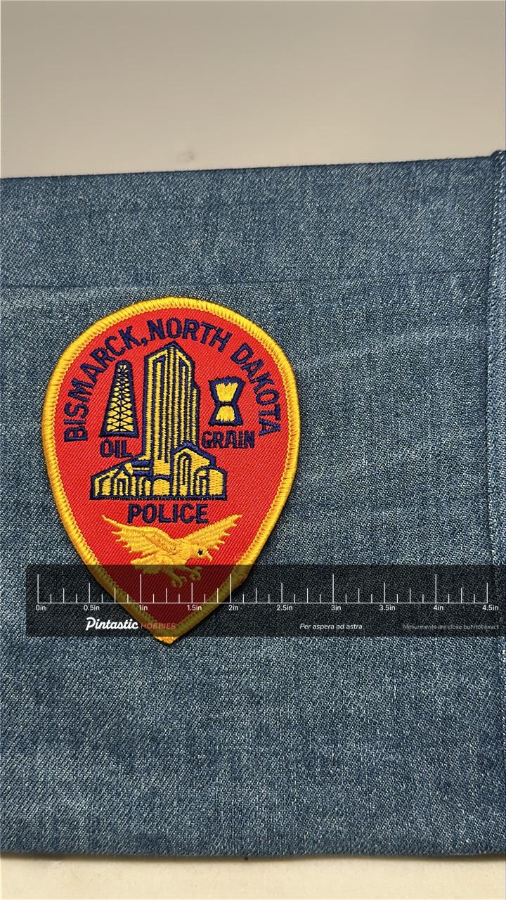 Bismarck ND Police Collectable Patch: Sew-On Red Finish - Civic Theme Accessory with ruler overlay for size reference