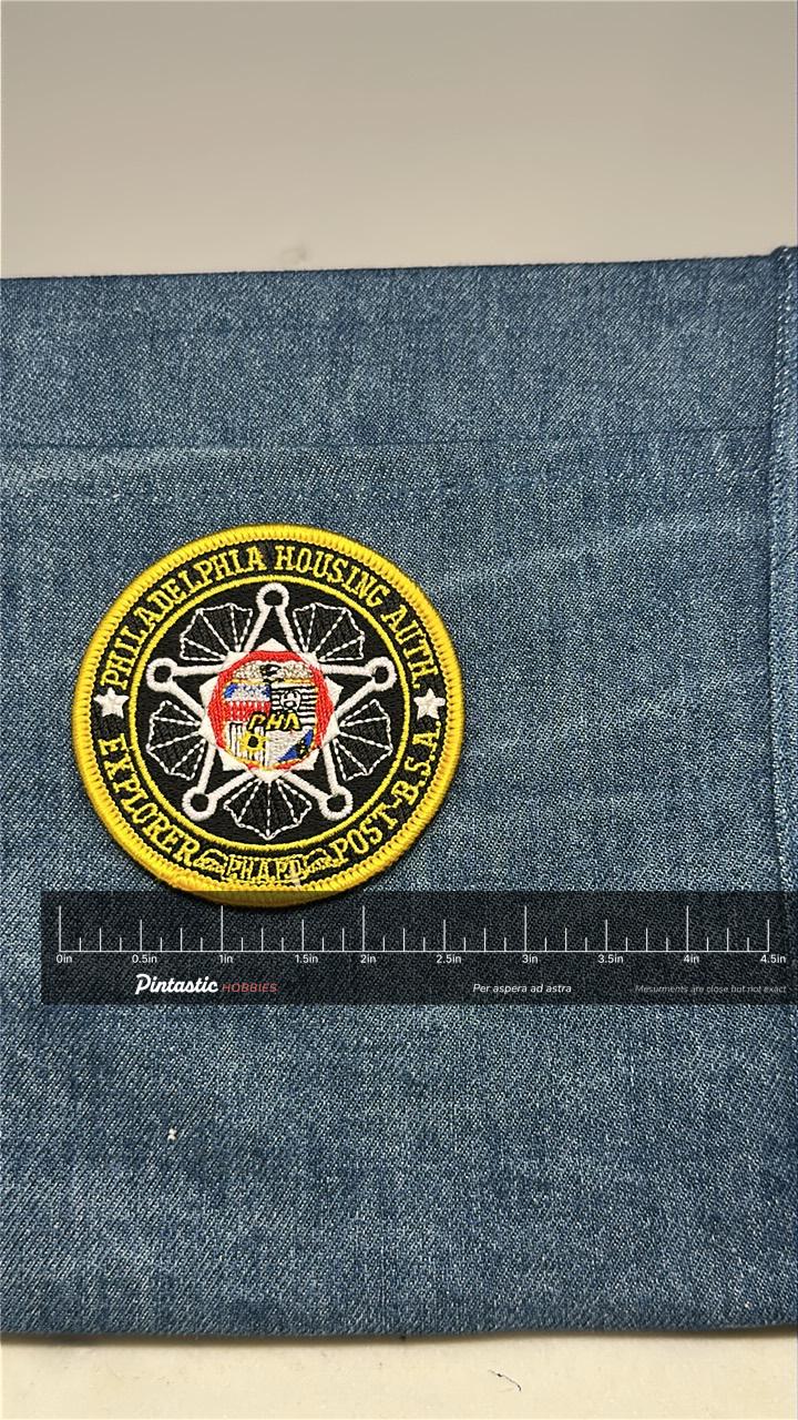 Philadelphia Housing Authority Patch: Iron-On Black/Yellow - Explorer BSA with ruler overlay for size reference