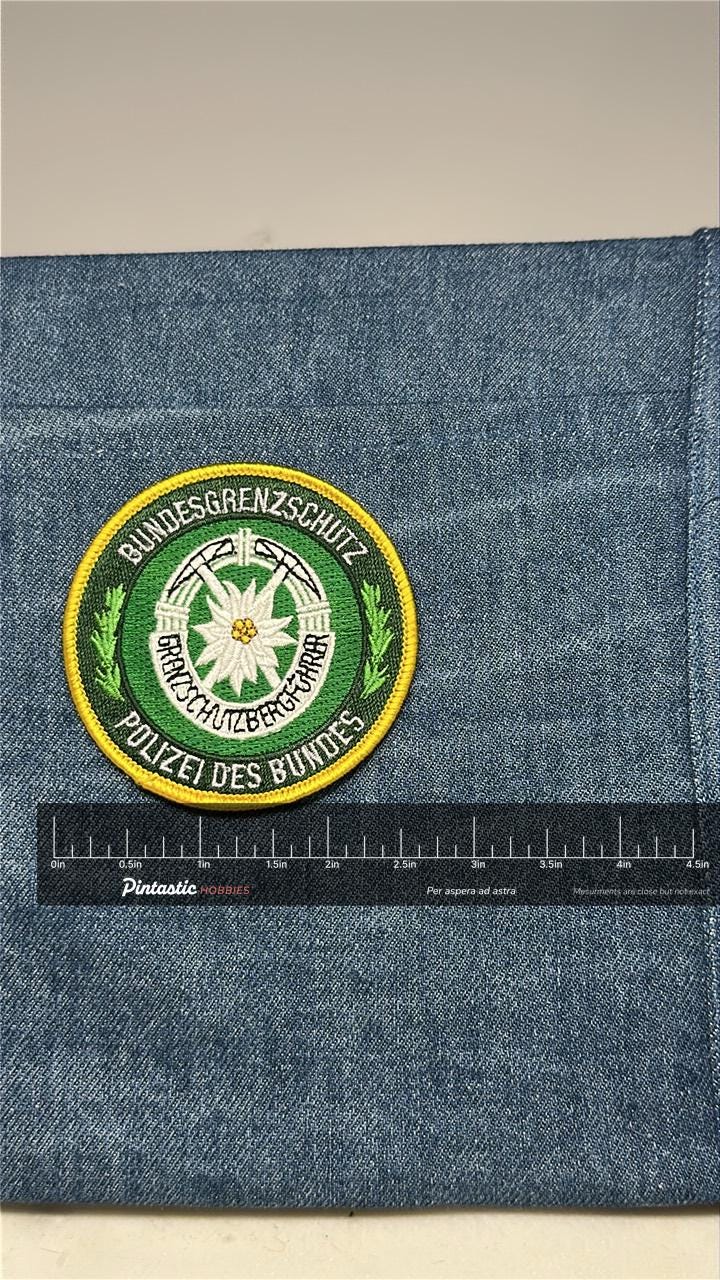 Bundesgrenzschutz Collectable Patch: Iron-On Green Circle - German Police Accessory with ruler overlay for size reference