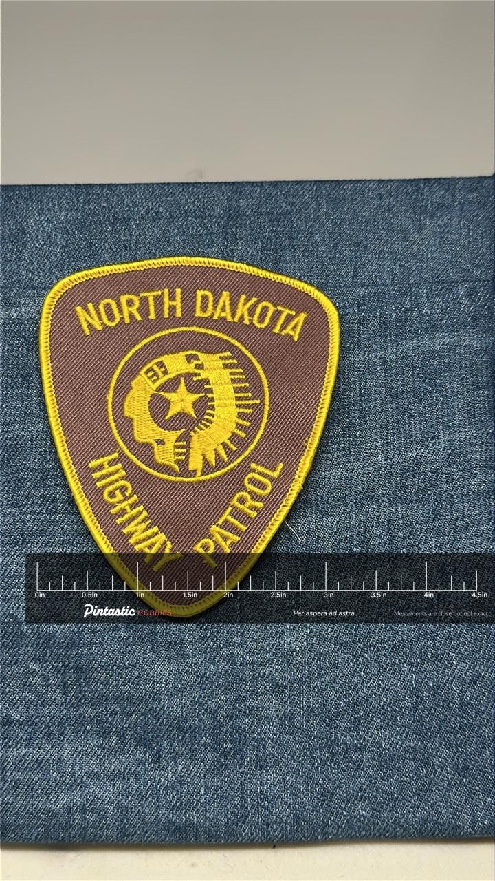North Dakota Highway Patrol Collectable Patch: Sew-On Brown/Gold - Law Enforcement Accessory with ruler overlay for size refe