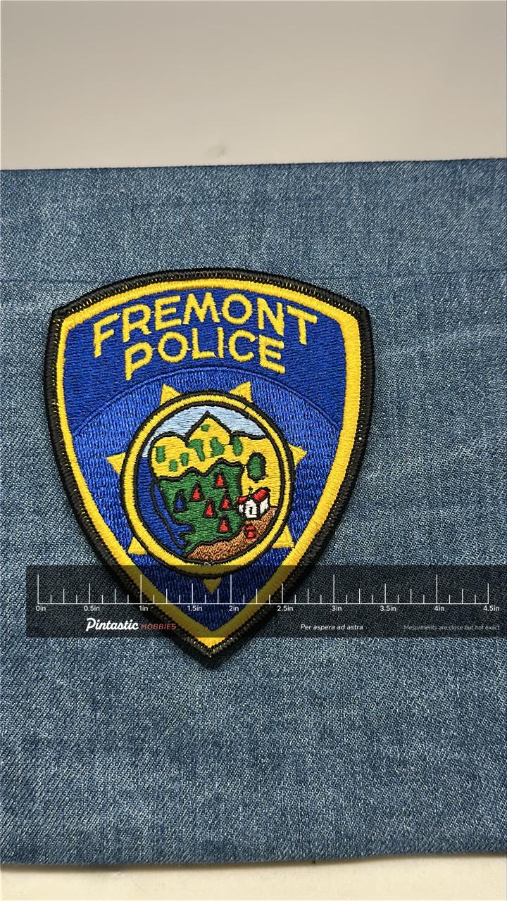 Fremont Police Collectable Patch: Iron-On Blue Yellow Shield - Law Enforcement Accessory with ruler overlay for size referenc