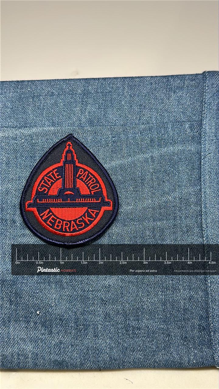 Nebraska State Patrol Collectable Patch: Iron-On Red/Black - Law Enforcement Accessory with ruler overlay for size reference
