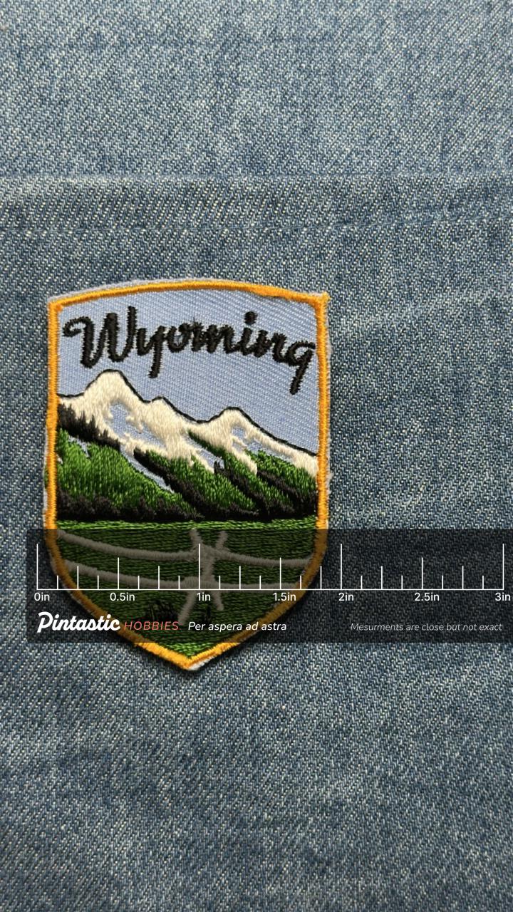 Wyoming Collectable Patch: Sew-On Scenic Shield - Vintage Travel Accessory with ruler overlay for size reference