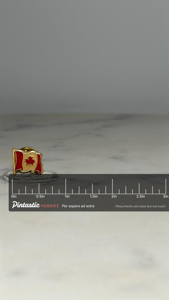 Canada Flag Lapel Pin: Red & Gold Enamel - Patriotic Accessory with ruler overlay for size reference