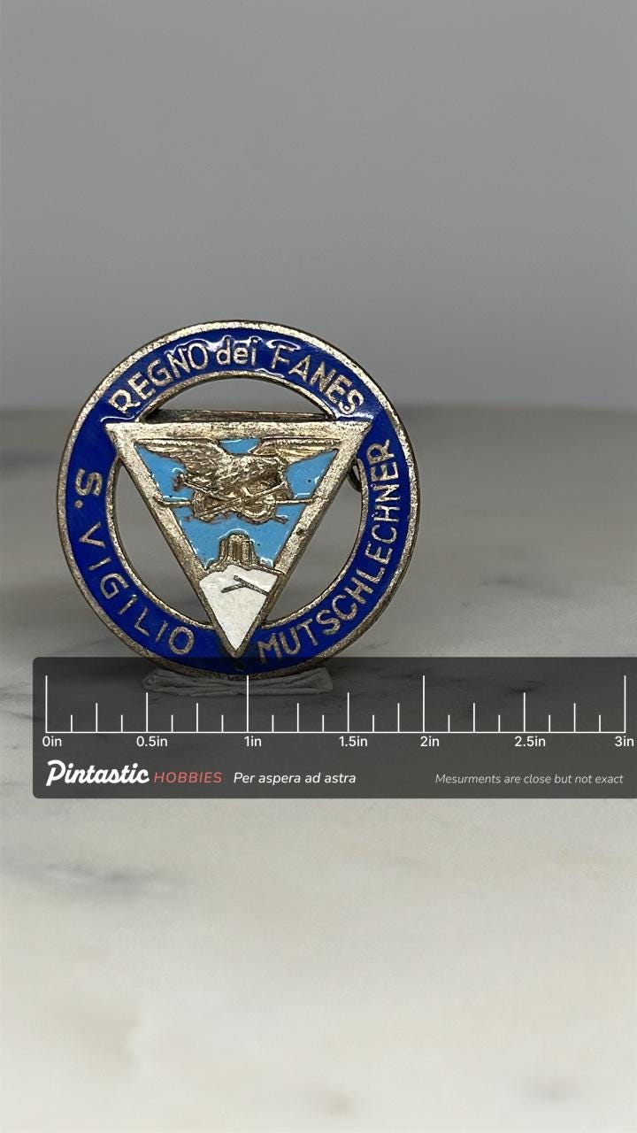 Regno dei Fanes Souvenir Pin: Blue Enamel Metal - Vintage Travel Accessory with ruler overlay for size reference
