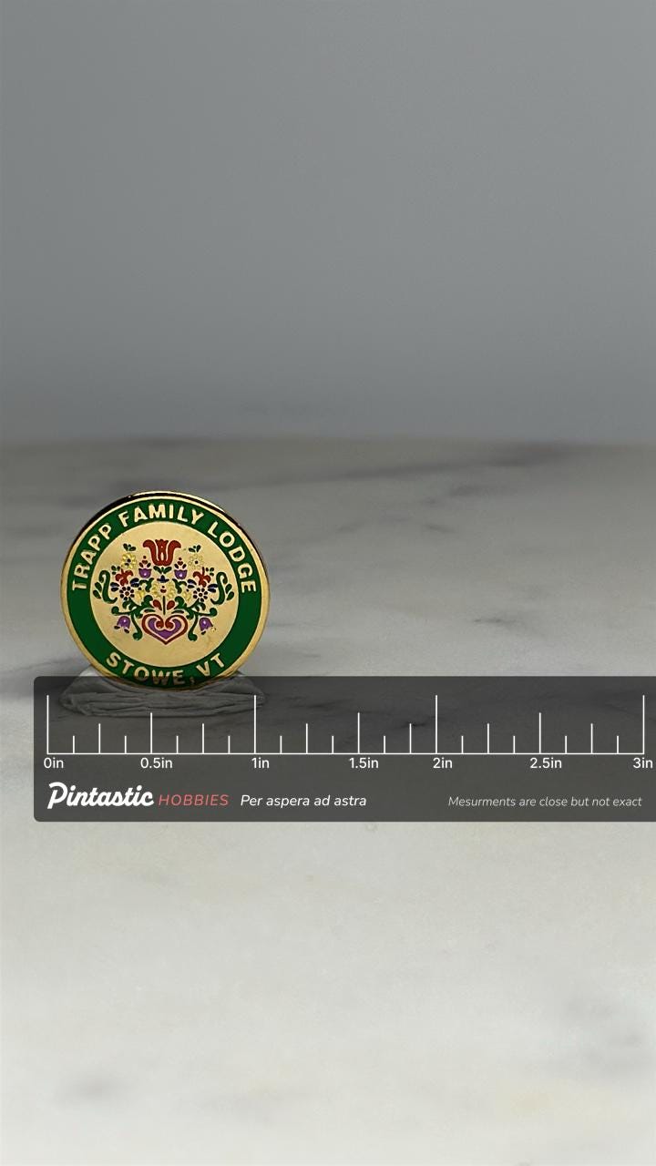 Trapp Family Lodge Souvenir Pin: Green & Gold Enamel - Vermont Travel Accessory with ruler overlay for size reference