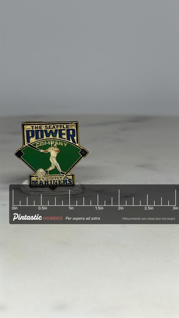 Ken Griffey Jr Mariners Pin: Green Enamel Baseball - 1990s Sports Accessory with ruler overlay for size reference