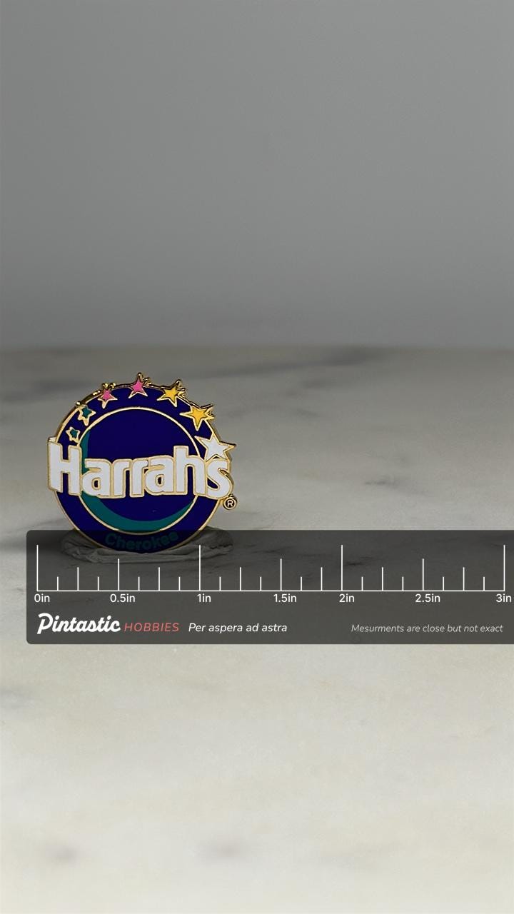 Harrah's Cherokee Casino Pin: Purple Gold Stars - Vintage Collectible Accessory with ruler overlay for size reference