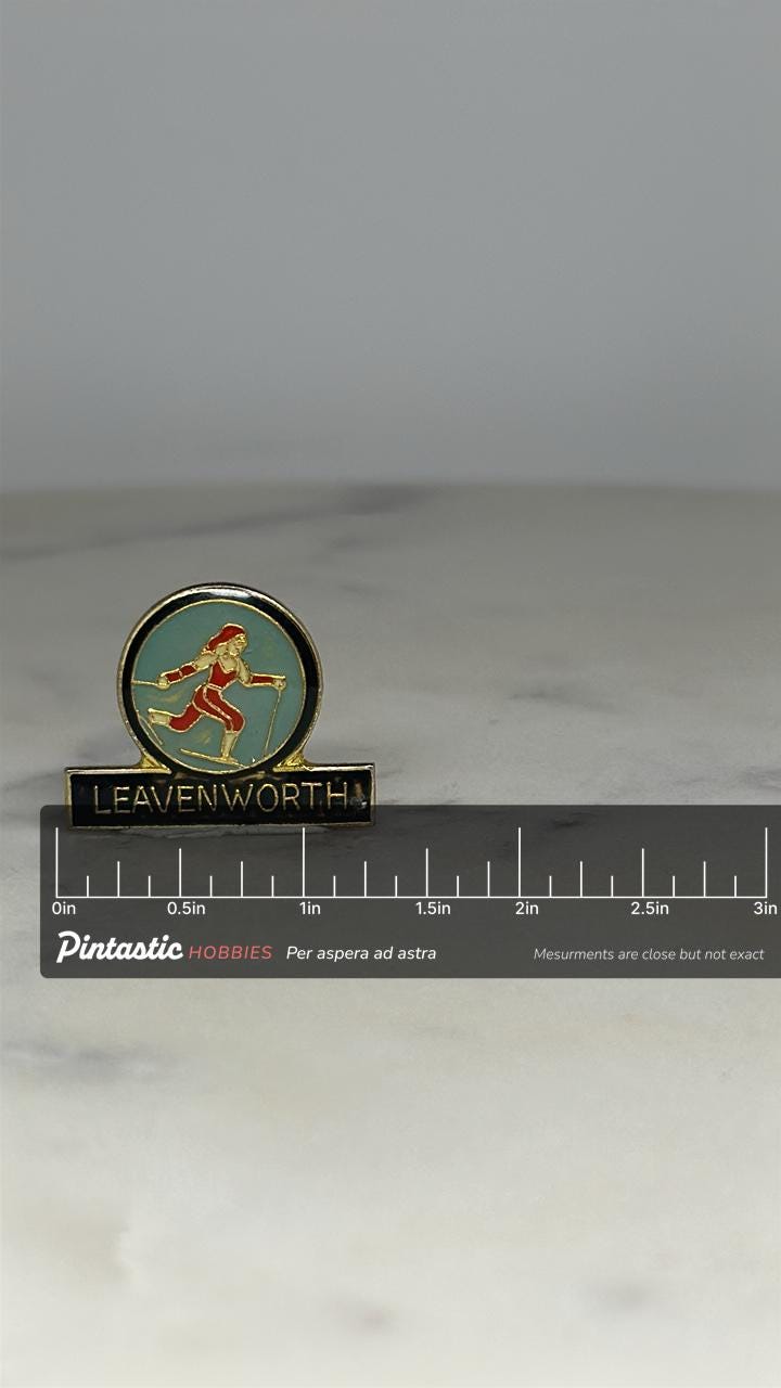 Leavenworth Skiing Pin: Red & Gold Enamel - Vintage Travel Accessory with ruler overlay for size reference