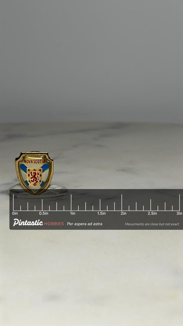 Nova Scotia Shield Pin: Gold Enamel Crest - Vintage Travel Souvenir Accessory with ruler overlay for size reference