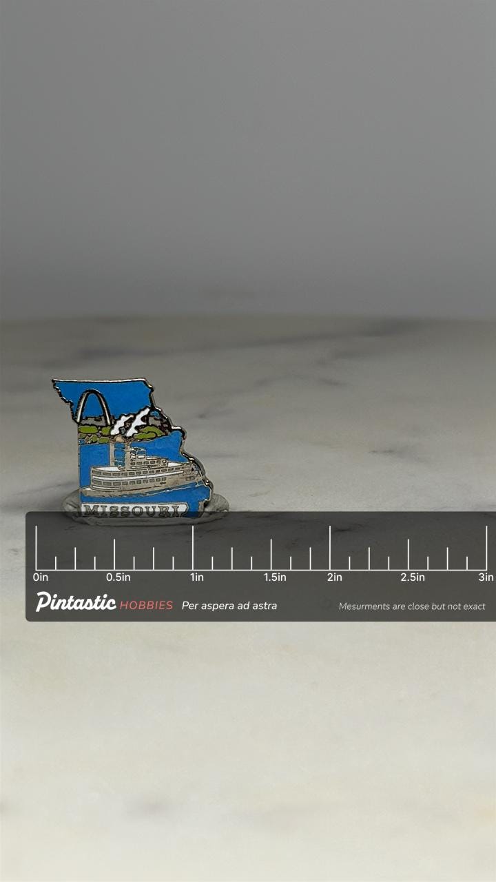 Missouri State Souvenir Pin: Silver Enamel Riverboat - Vintage Travel Accessory with ruler overlay for size reference