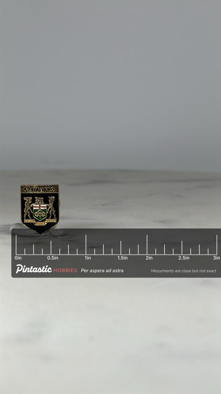 Ontario Crest Lapel Pin: Gold & Black Enamel - Vintage Souvenir Accessory with ruler overlay for size reference