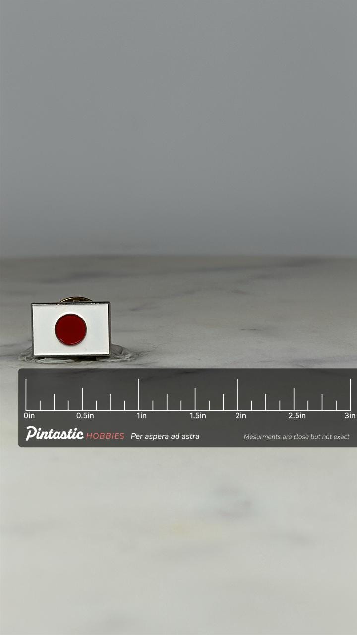 Japan Flag Pin: Red & White Enamel - National Pride Accessory with ruler overlay for size reference