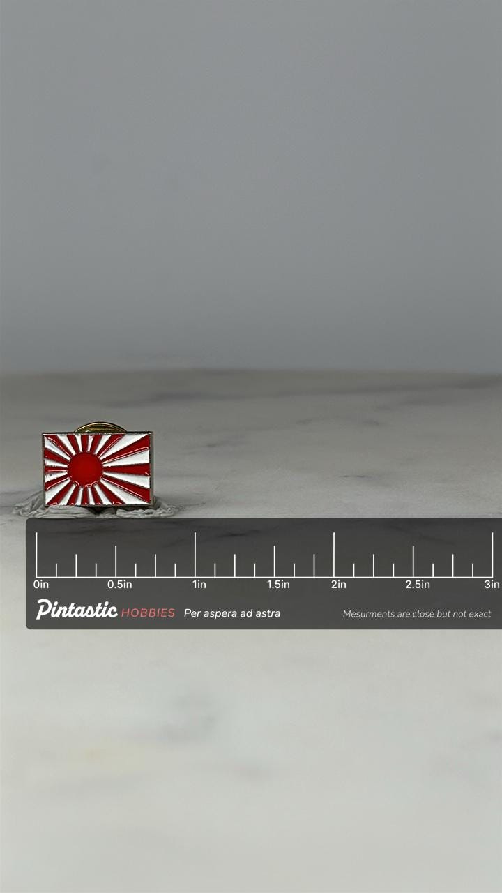 Japan Rising Sun Flag Pin: Red & White Enamel - Military History Accessory with ruler overlay for size reference