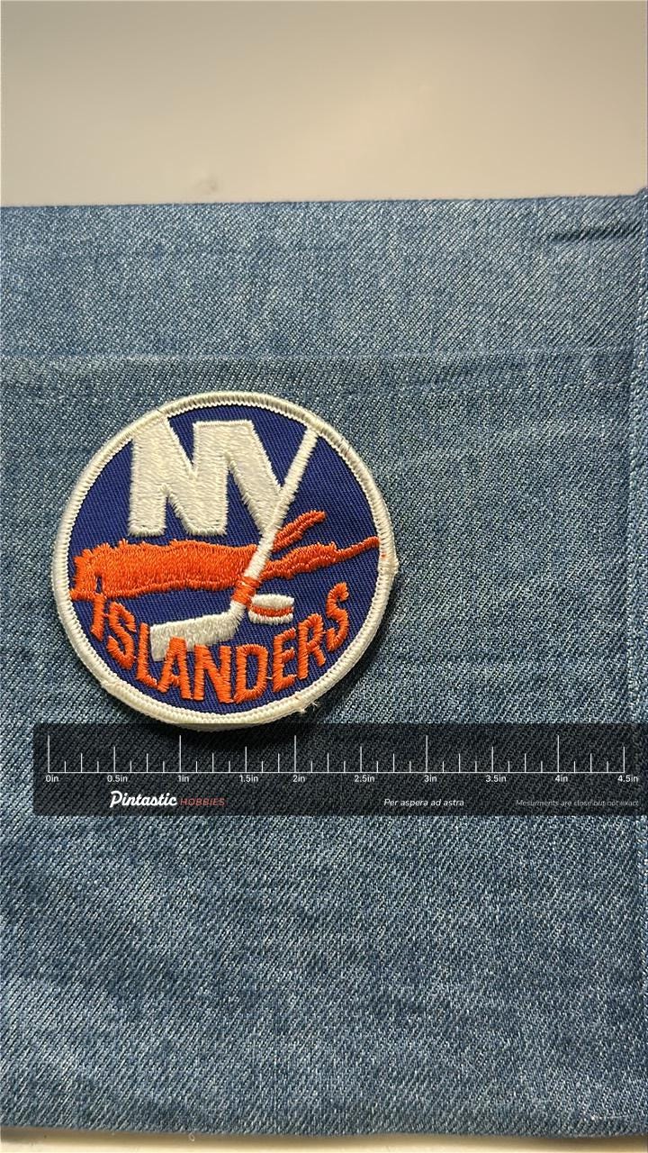NY Islanders Collectable Patch: Sew-On Blue/Orange Classic - Vintage Sports Accessory with ruler overlay for size reference