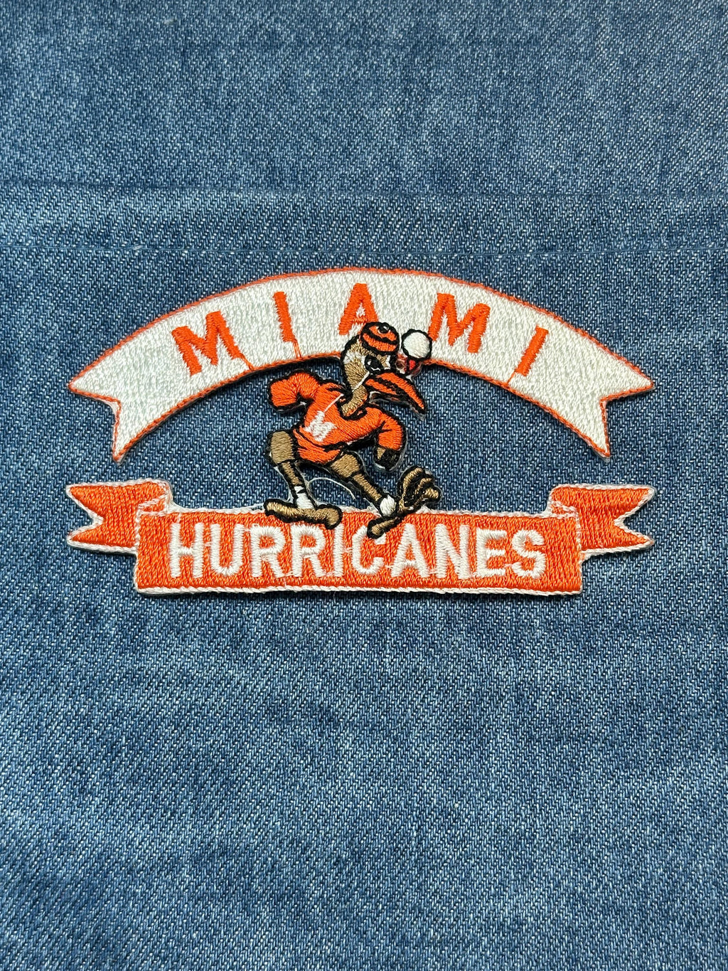 Miami Hurricanes Collectable Patch: Iron-On Orange/White Finish - Retro College Accessory