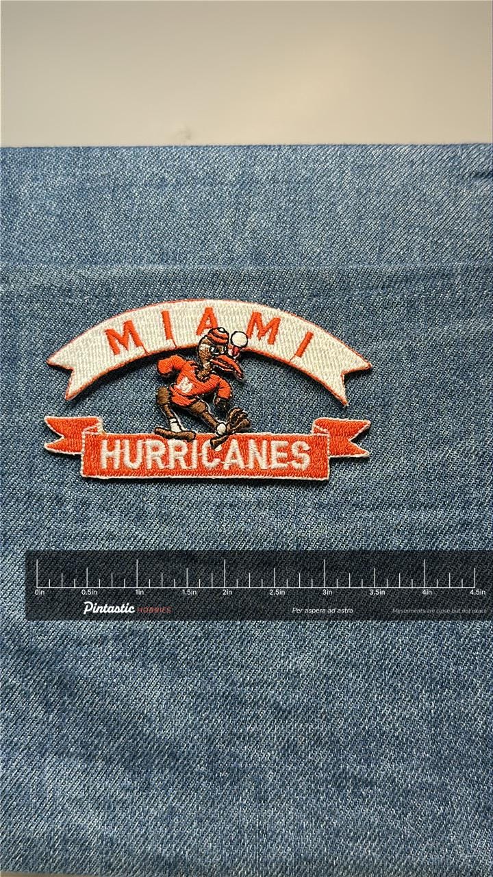 Miami Hurricanes Collectable Patch: Iron-On Orange/White Finish - Retro College Accessory with ruler overlay for size referen