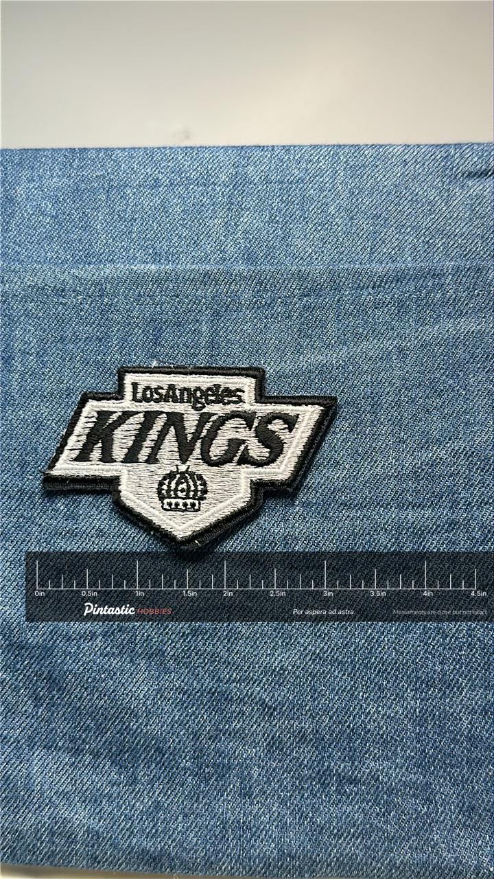 Los Angeles Kings Patch: Sew-On Black & Silver - Sports Accessory with ruler overlay for size reference