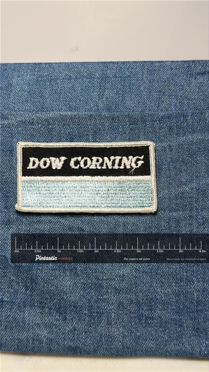 Dow Corning Collectable Patch: Sew-On Black Aqua - Vintage Company Accessory with ruler overlay for size reference
