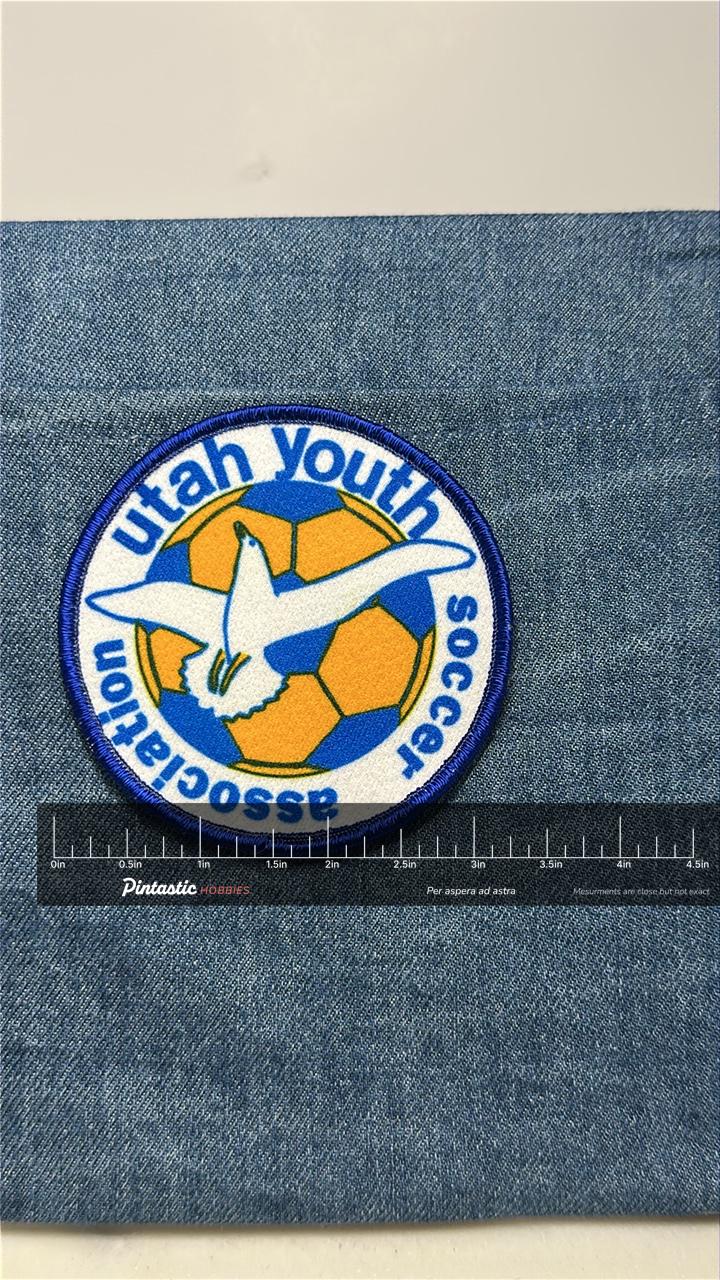 Utah Youth Soccer Patch: Sew-On Twill Finish - Vintage Sports Accessory with ruler overlay for size reference