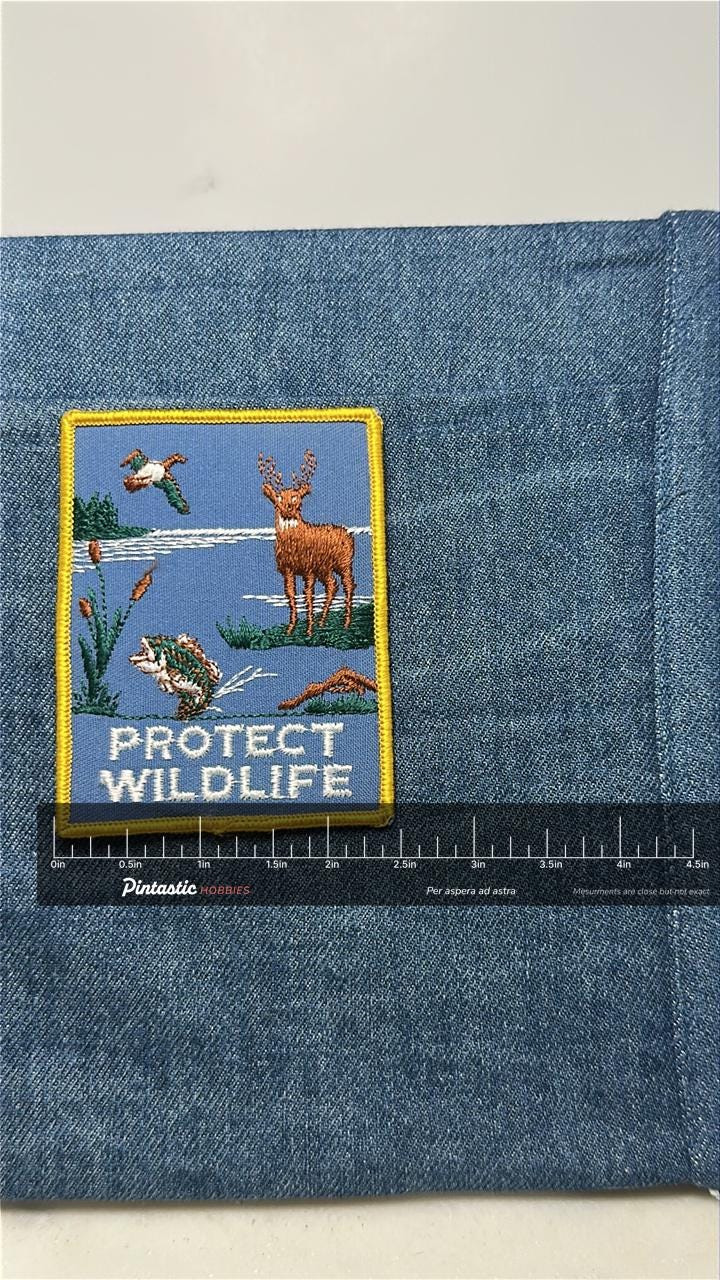Protect Wildlife Collectable Patch: Iron-On Blue & Yellow - Nature Accessory with ruler overlay for size reference
