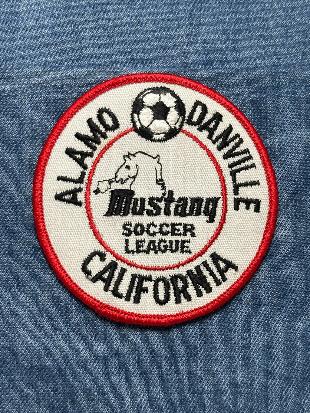 Mustang Soccer League Patch: Iron-On Red Border - Youth Sports Accessory