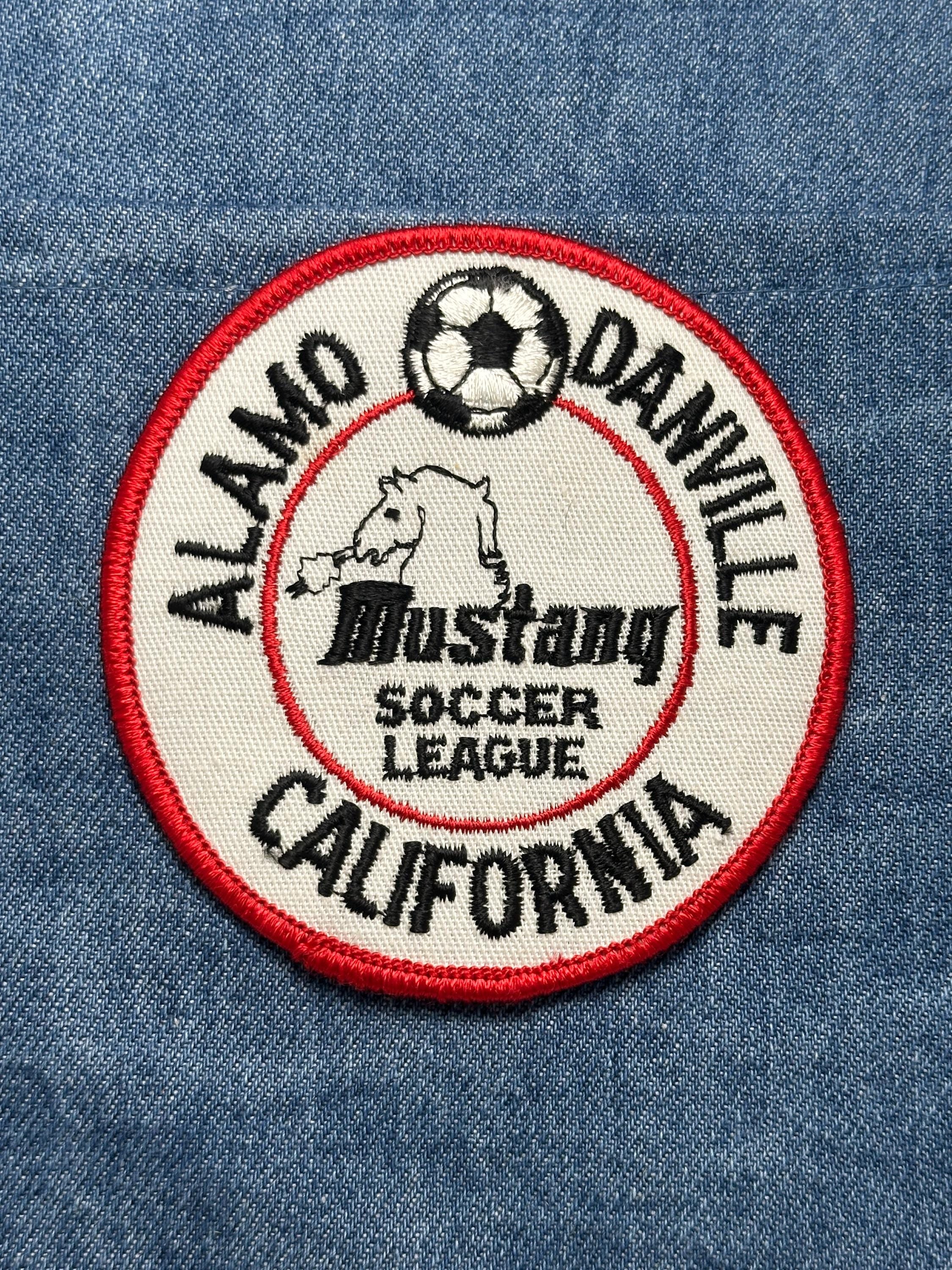 Mustang Soccer League Patch: Iron-On Red Border - Youth Sports Accessory