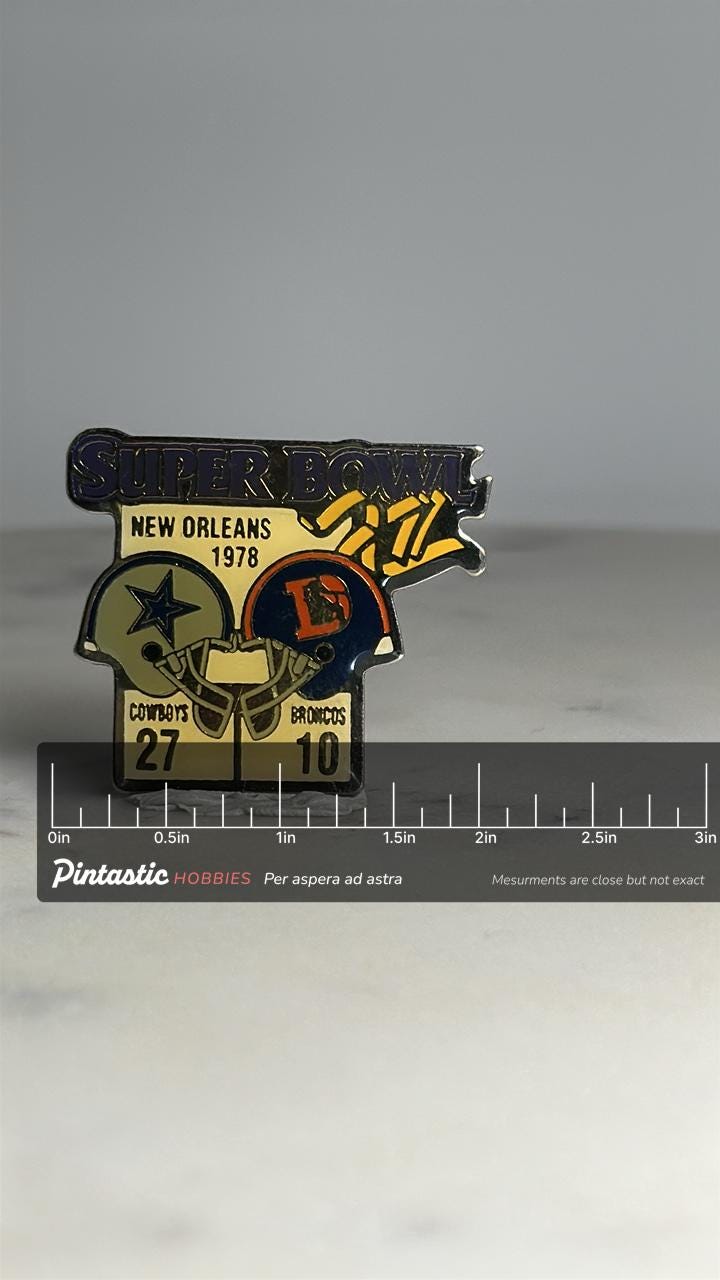 Super Bowl XII Football Pin: Dallas vs Denver Gold Enamel - 1978 Sports Accessory with ruler overlay for size reference