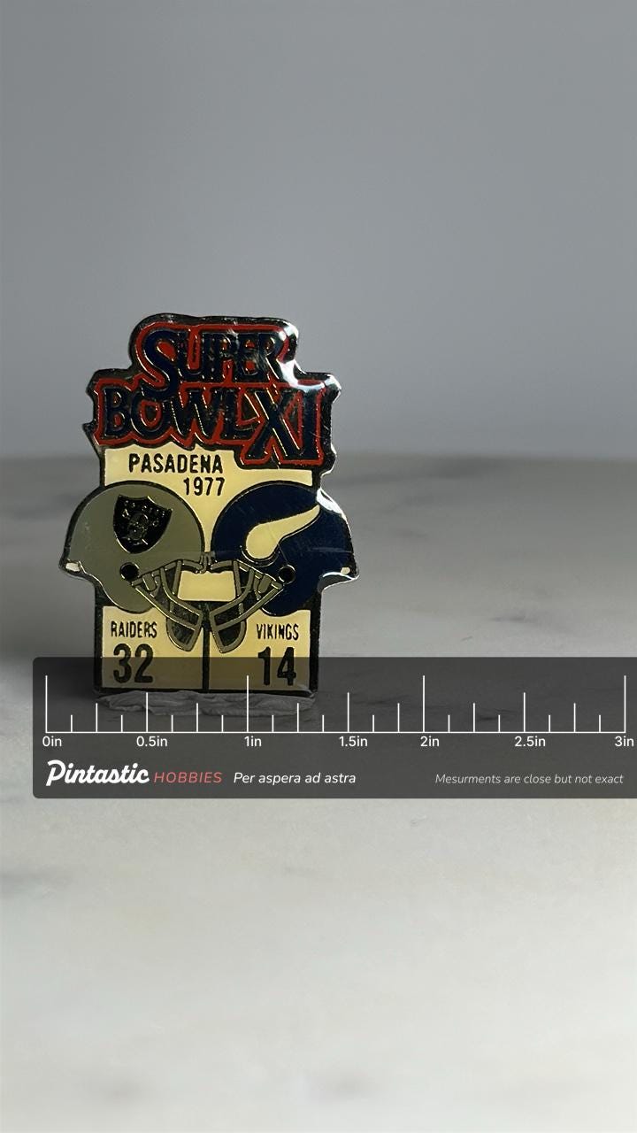 Super Bowl XI Collector Pin: Raiders vs Vikings Enamel - 1977 Sports Accessory with ruler overlay for size reference