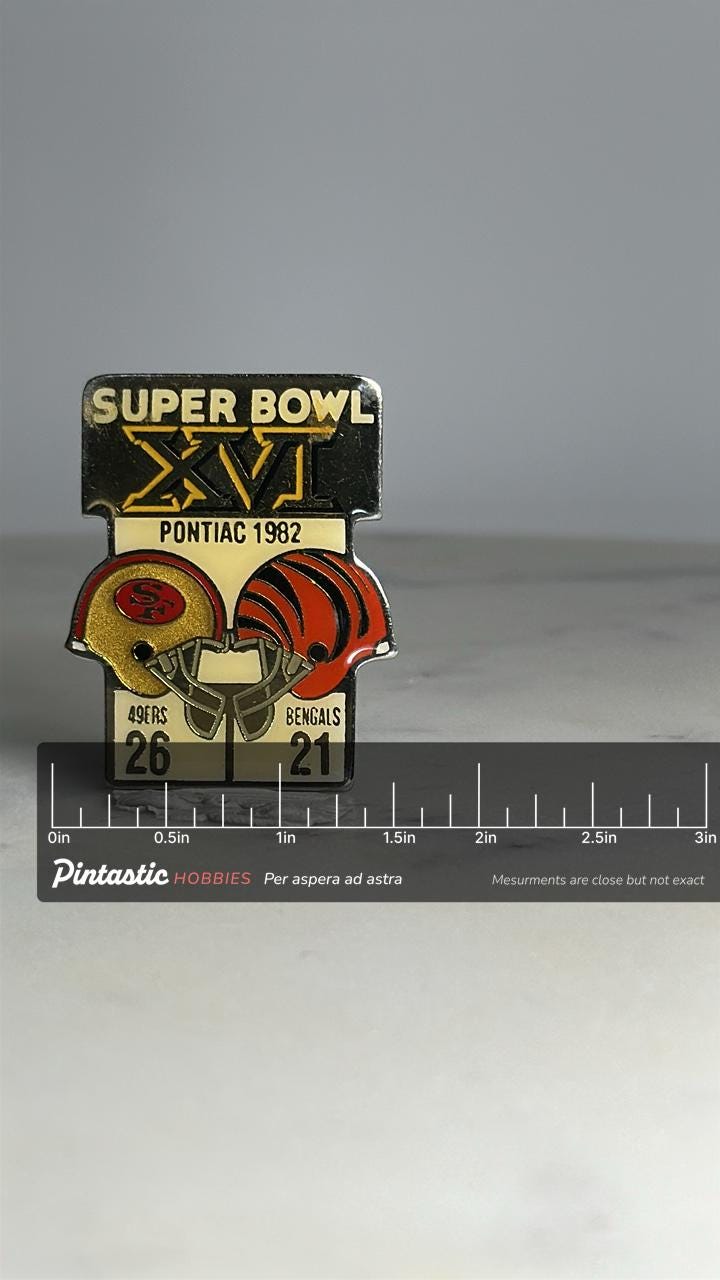 Super Bowl XVI Football Pin: Gold & Orange Enamel - 1980s Sports Accessory with ruler overlay for size reference