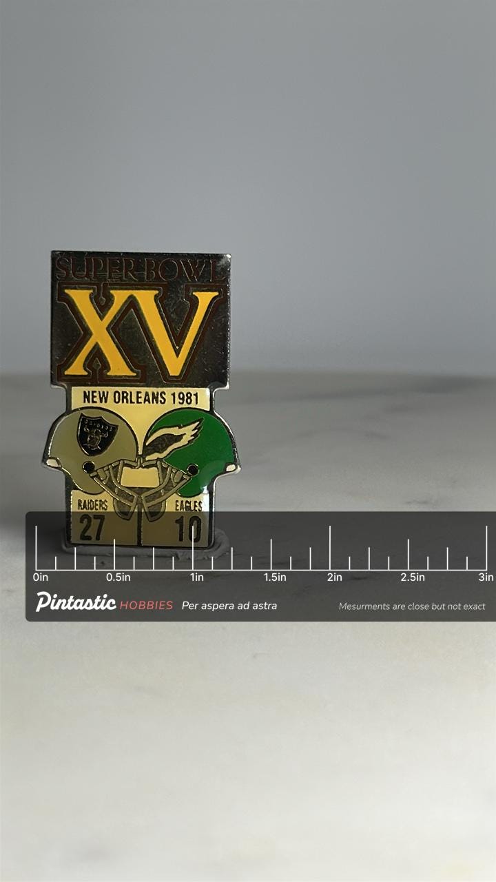 Super Bowl XV Commemorative Pin: Yellow & Silver Enamel - 1981 Sports Accessory with ruler overlay for size reference