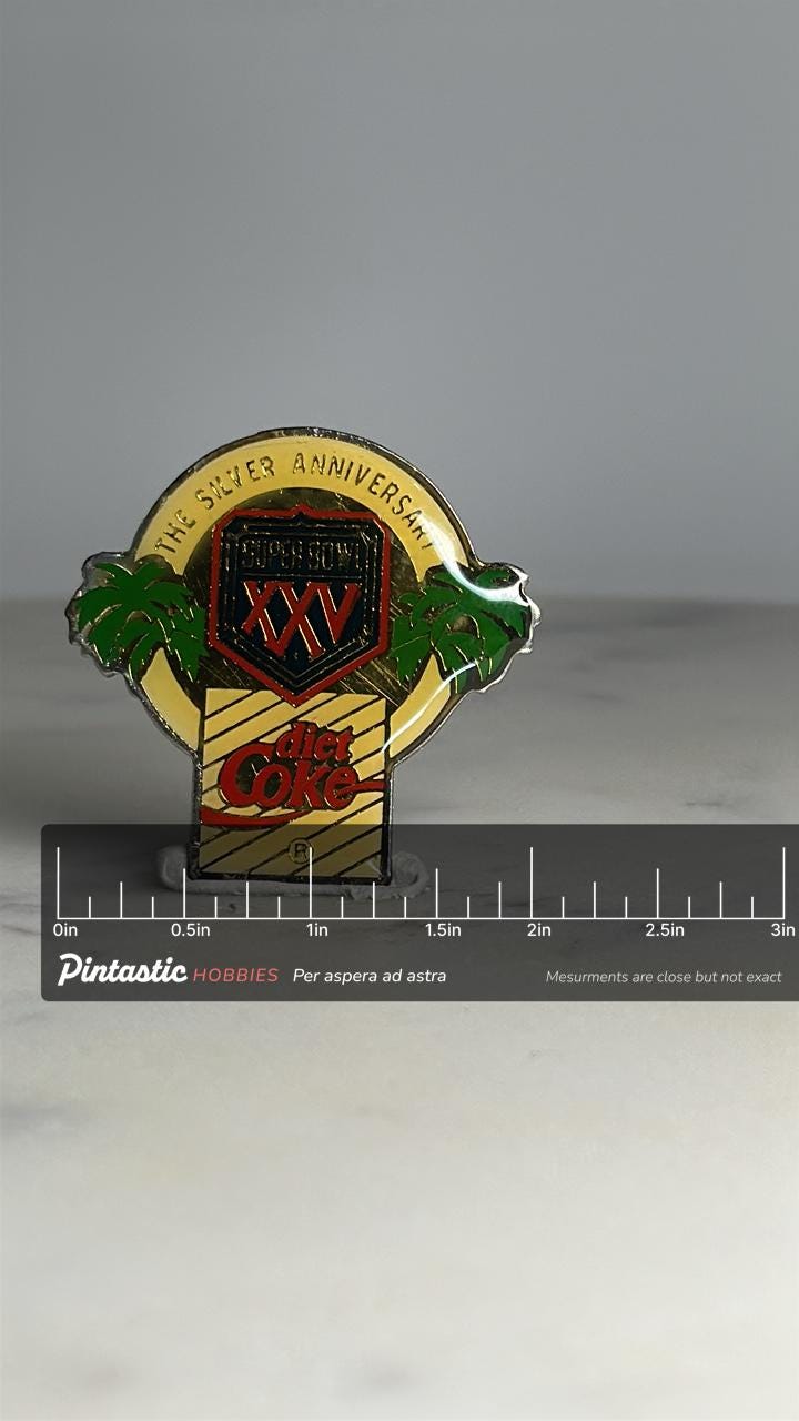Super Bowl XXV Diet Coke Pin: Gold Enamel Finish - 1990s Sports Accessory with ruler overlay for size reference