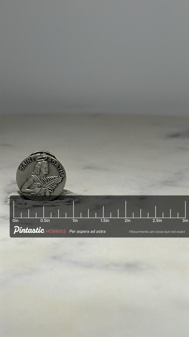 Saint Agatha Religious Pin: Antique Silver Tone - Catholic Faith Accessory with ruler overlay for size reference
